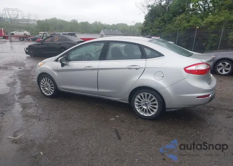 2014 Ford Fiesta Titanium z USA, uszkodzony, nr VIN 3FADP4CJ1EM206947